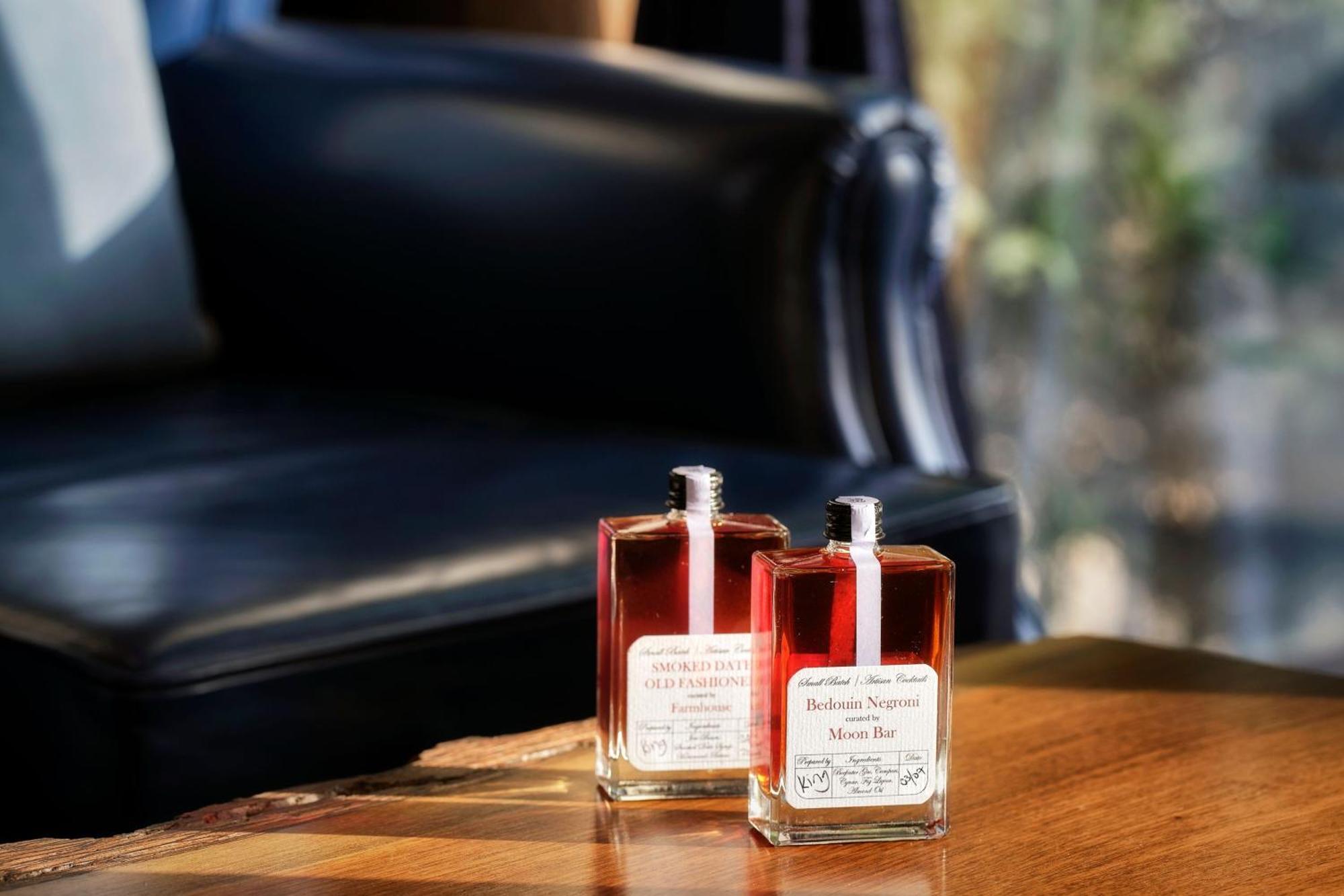 The Ritz-Carlton Ras Al Khaimah, Al Wadi Desert Bagian luar foto Two bottles of gin