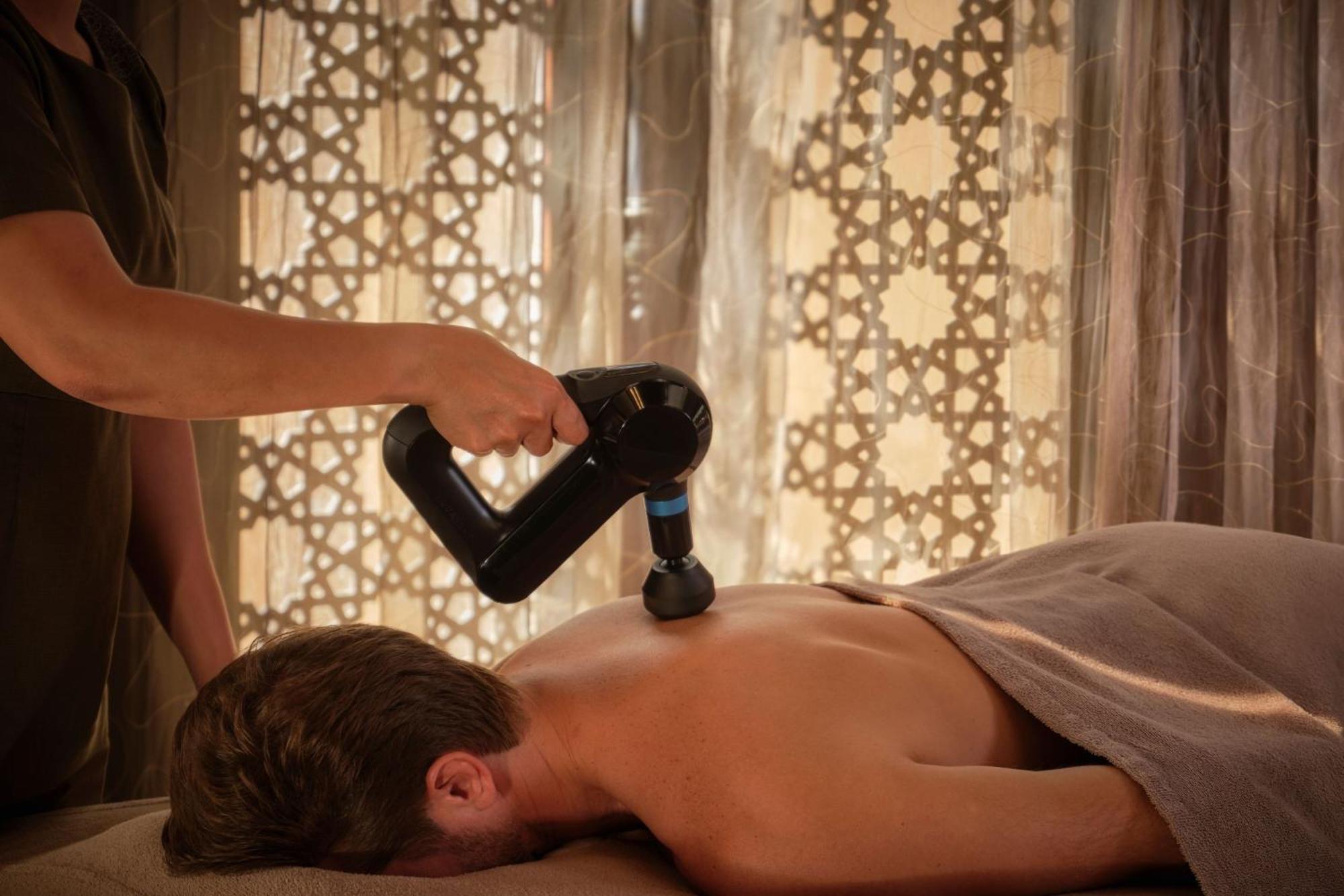 The Ritz-Carlton Ras Al Khaimah, Al Wadi Desert Bagian luar foto Massage gun in use